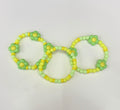 Green and yellow flower bracelet stack (3)