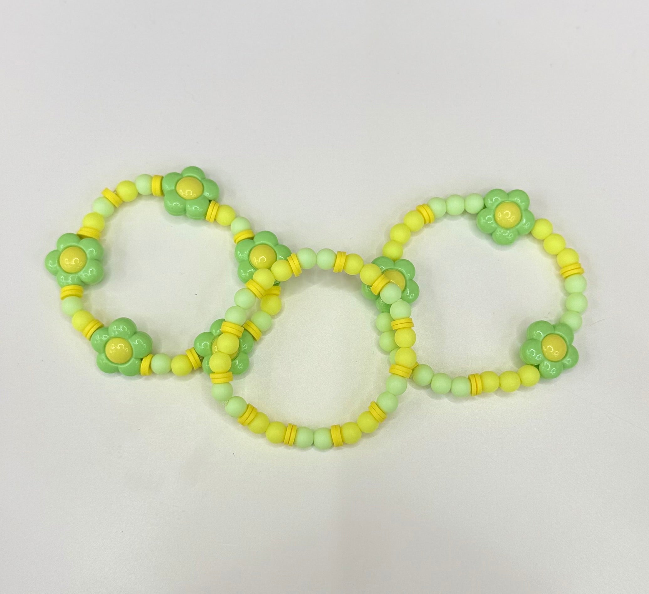 Green and yellow flower bracelet stack (3)