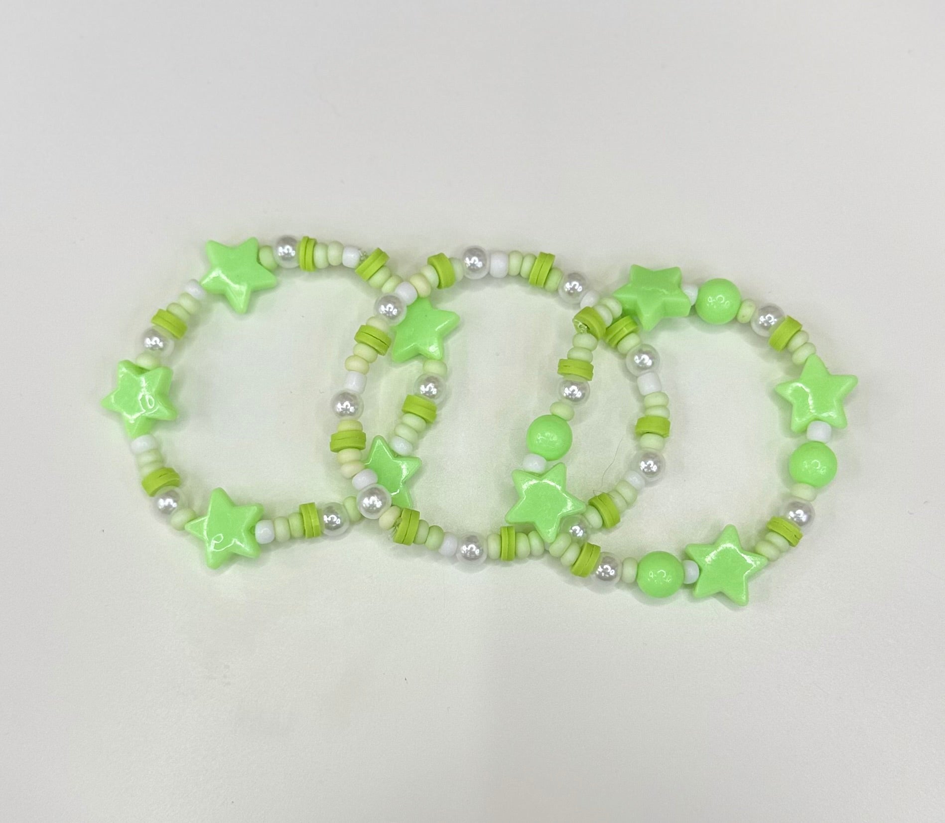 Green star bracelet stack (3)